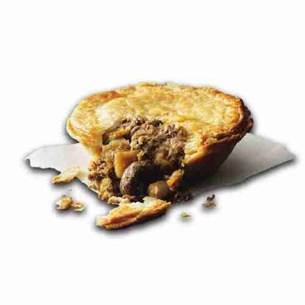 Peppercorn Steak Pie cut open to reveal tender beef in creamy peppercorn gravy.